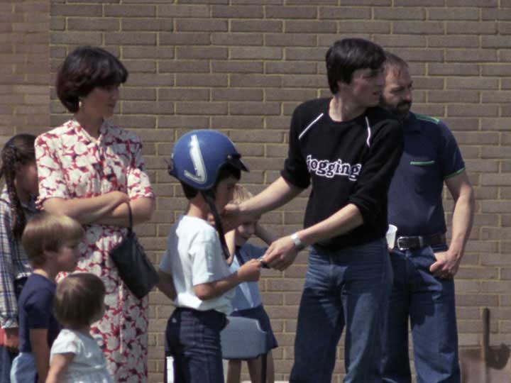 Iain puts on a crash helmet