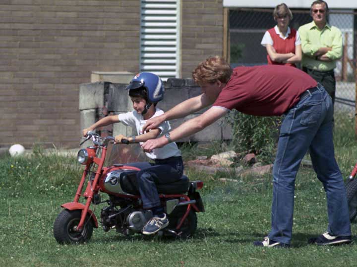 Iain sets of on a motor bike