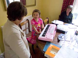 Lily and her keyboard, with Rosemary