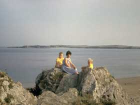 Rosemary, Stephen and Erica on a rock
